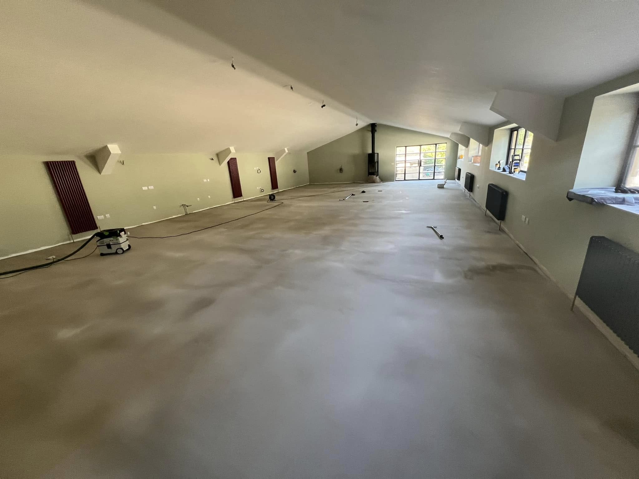 The long room after levelling, a smooth even floor
